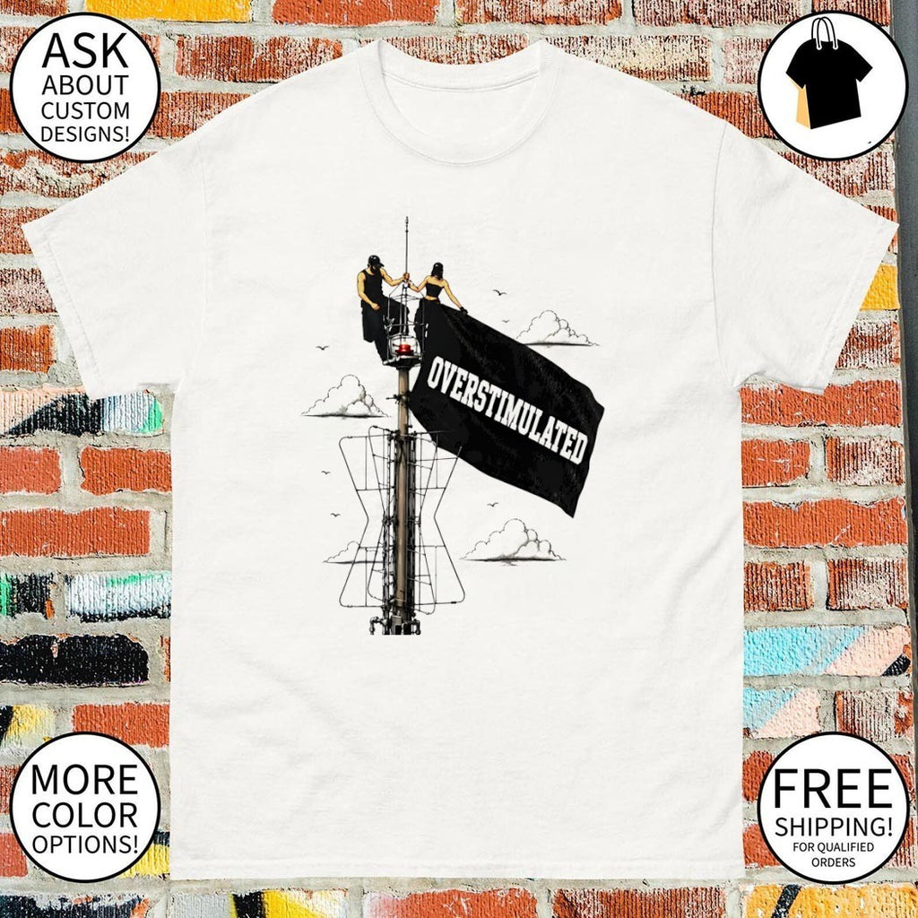 Angela Nikolau and Ivan Beerkus Empire State Building holding Overstimulated flag shirt
