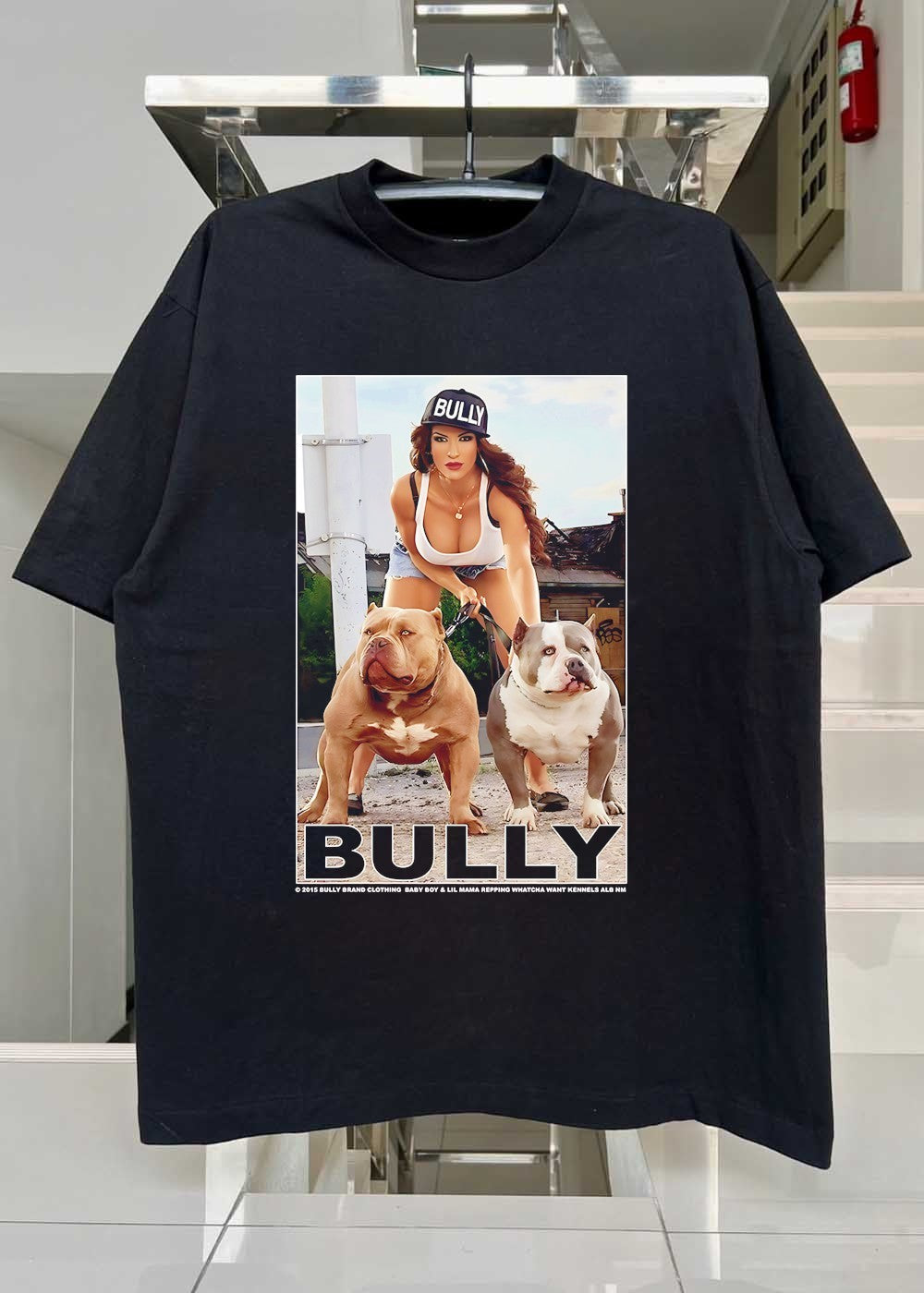Bully Brand Clothing Baby Boy and Lil Mama Repping Whatcha Want Kennels Alb NM Woman Posing with Two American Bully Dogs T-Shirt