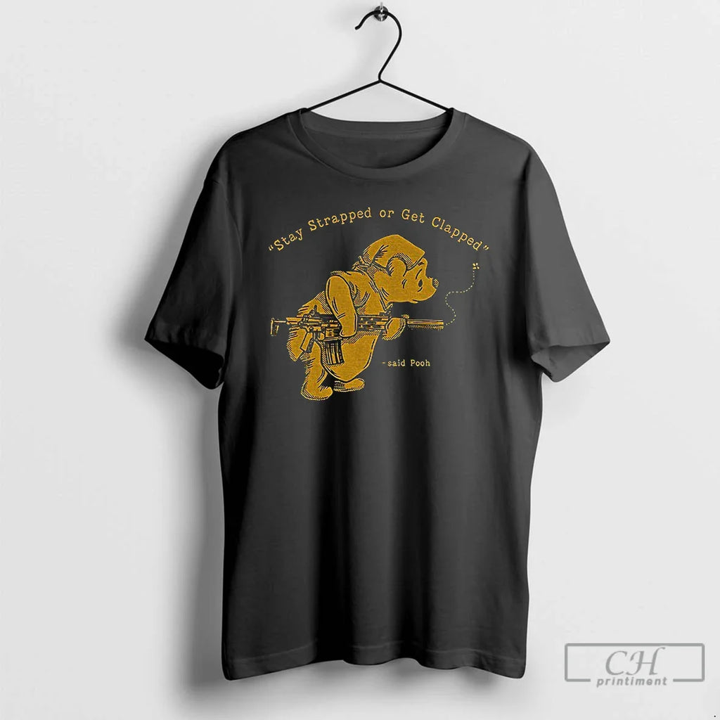 Classic Stay Strapped Get Clapped Winnie Pooh Holding Gun T-Shirts, Hoodie, Sweatshirt