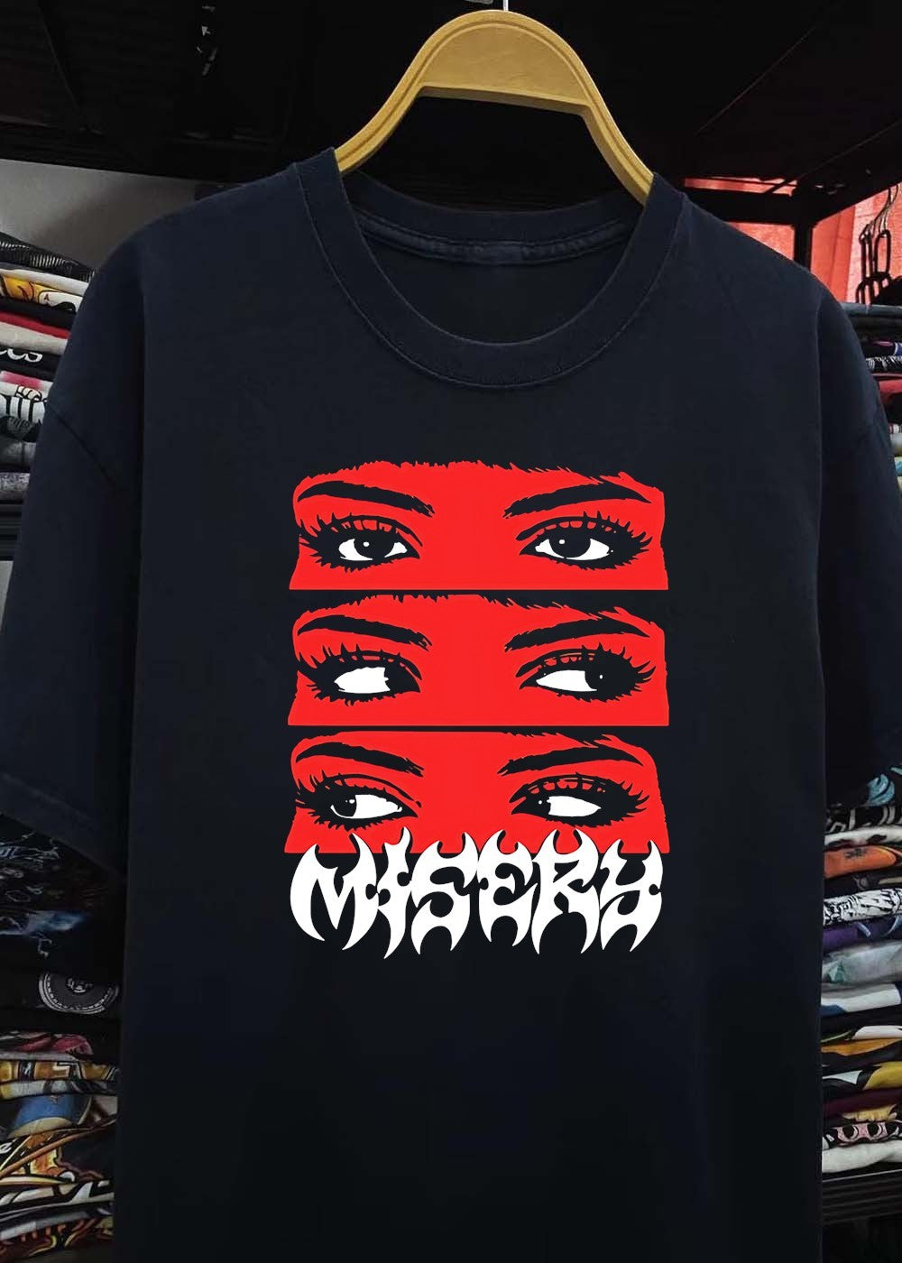 Is A Graphic Department Misery Eyes Glancing Graphic T-Shirt