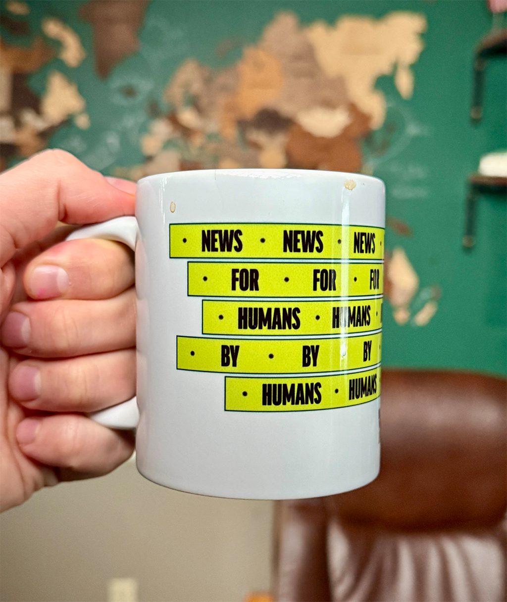 News by Humans For Humans Mug