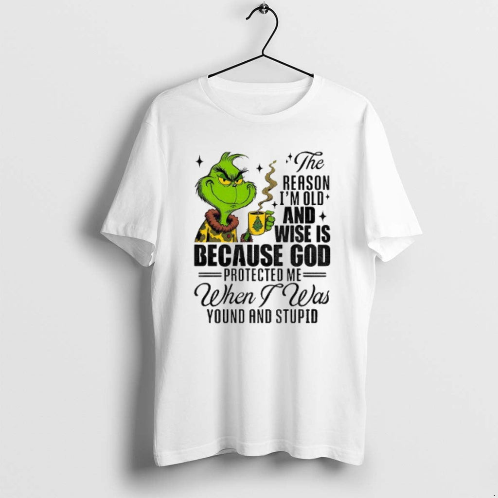 Official Grinch Santa Reason Im Old Wise Is Because God Protected Me When T-Shirts, Hoodie, Sweatshirt