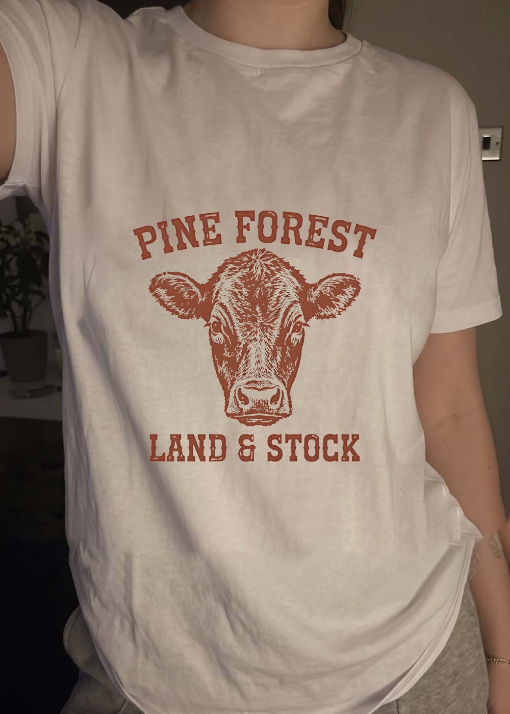 Pine Forest Land & Stock Cow T-Shirt