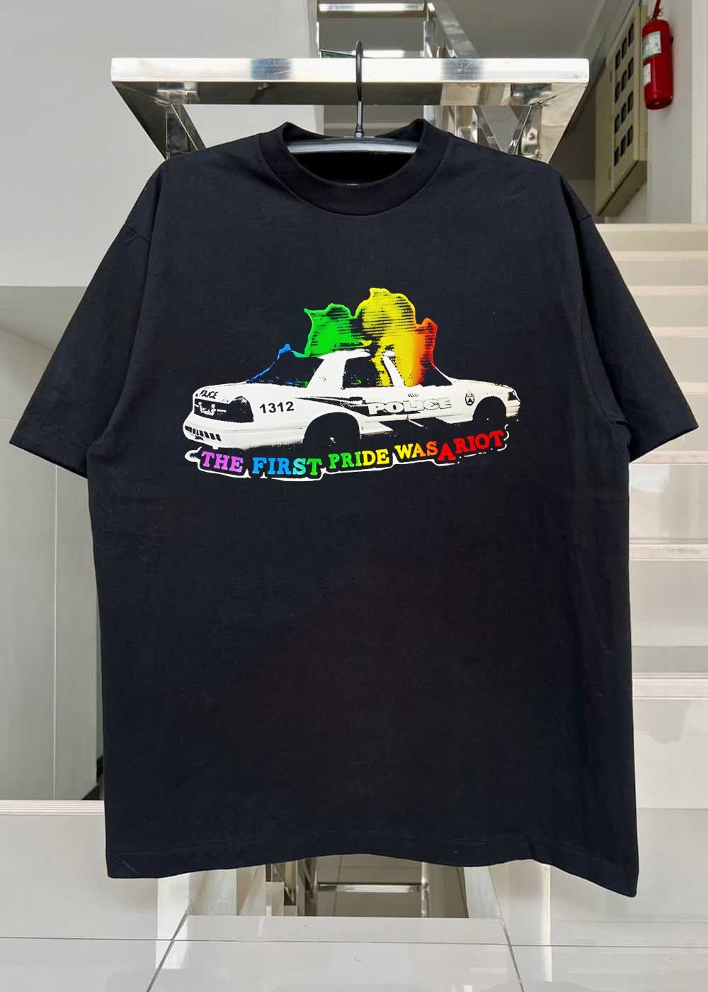 The First Pride Was a Riot Police Car T-Shirt
