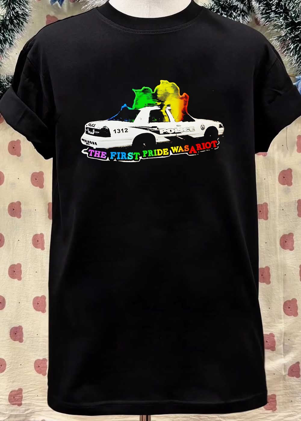The First Pride Was a Riot Police Car T-Shirt