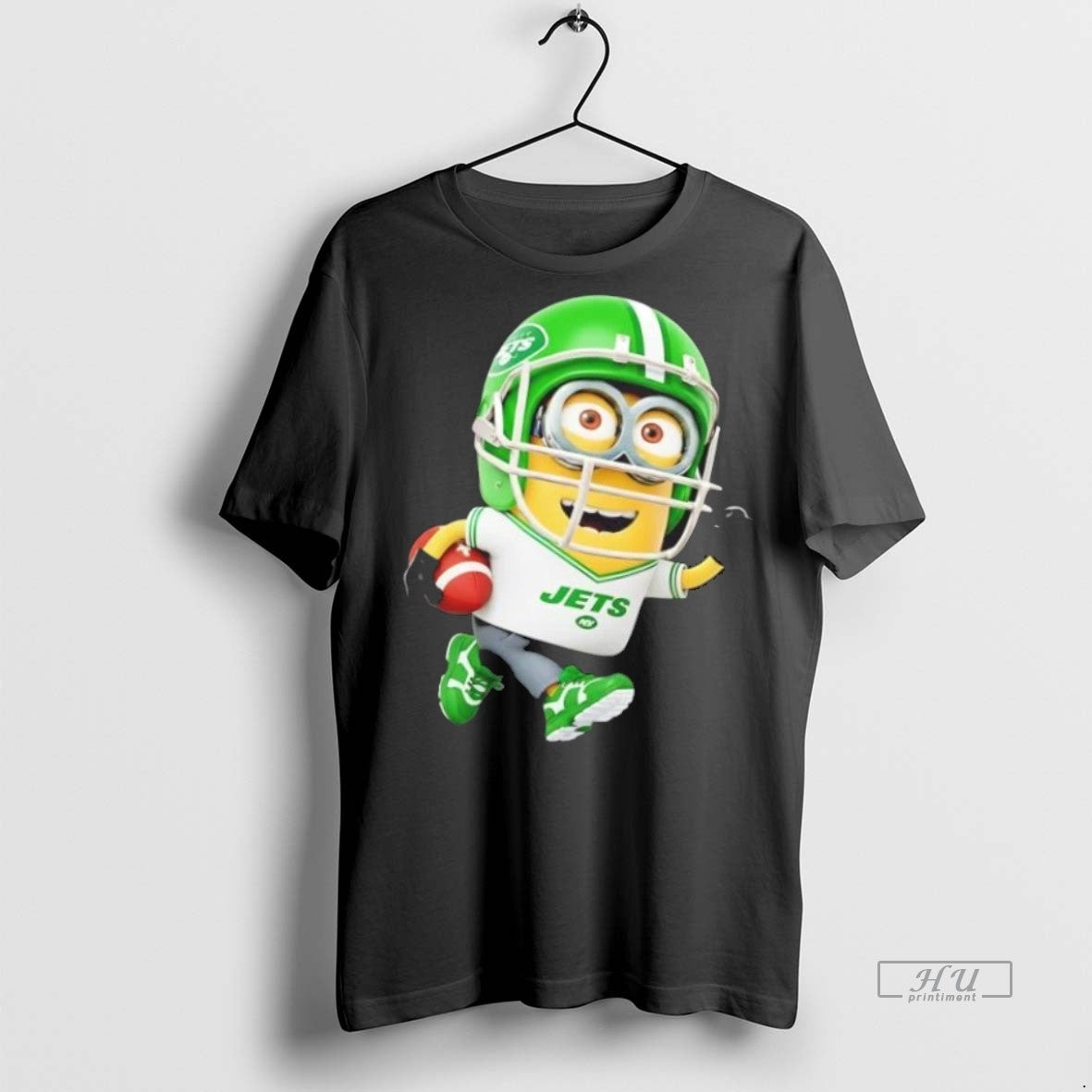 Trending Minions Is Holding A Ball And Smiling At New York Jets Fans Graphic Tee