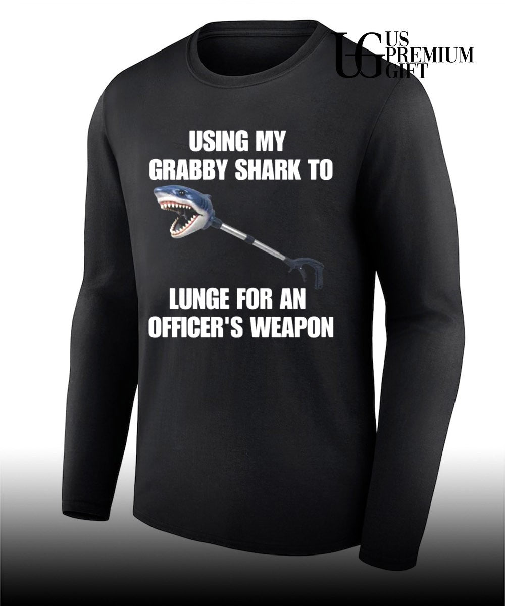 Using my grabby shark to lunge for an officer’s weapon shirt