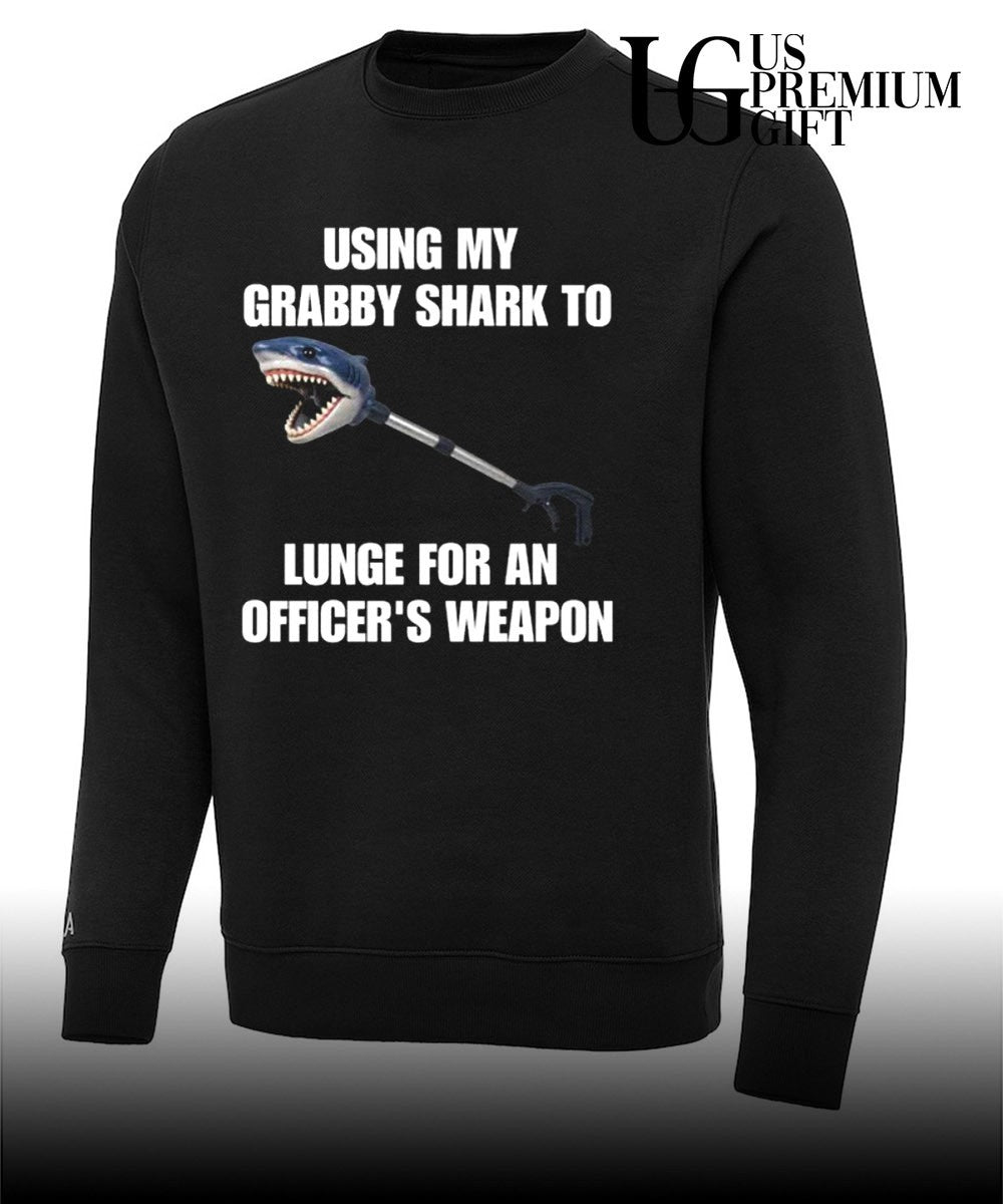 Using my grabby shark to lunge for an officer’s weapon shirt