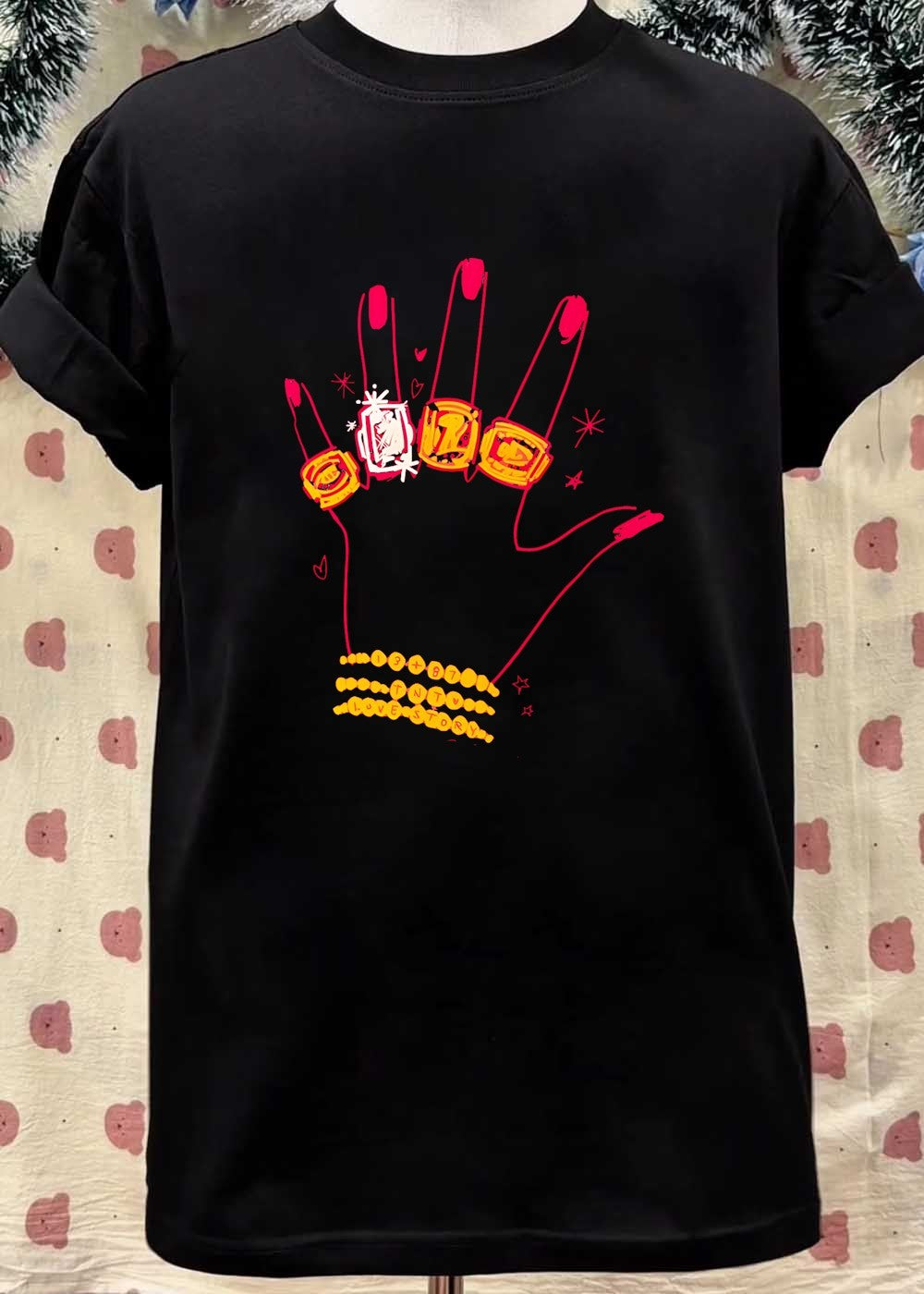 Hand Wearing Rings and Bracelets 13 + 87 TNT Love Story T-Shirt