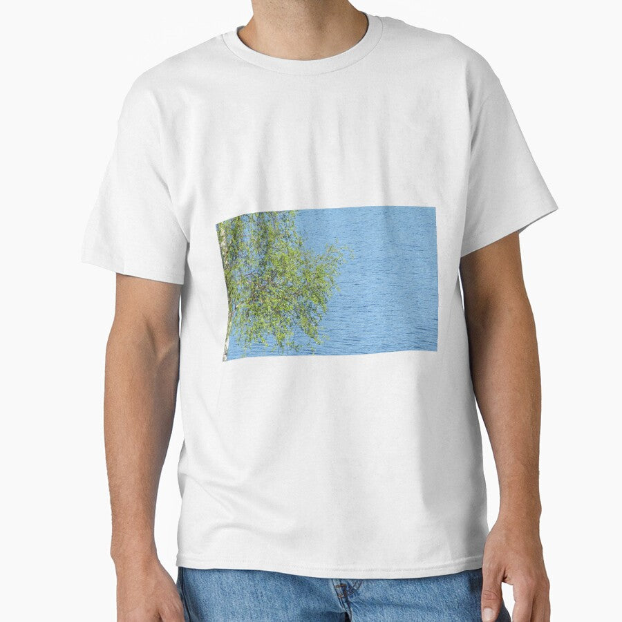 birch bunch of leaves the lake in the background by PVagberg