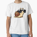A cool snail wearing sunglasses while slowly moving forward. The design humorously celebrates slow living and relaxed personalities. by Dejbar