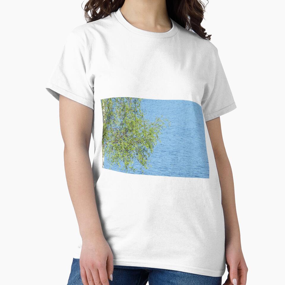 birch bunch of leaves the lake in the background by PVagberg
