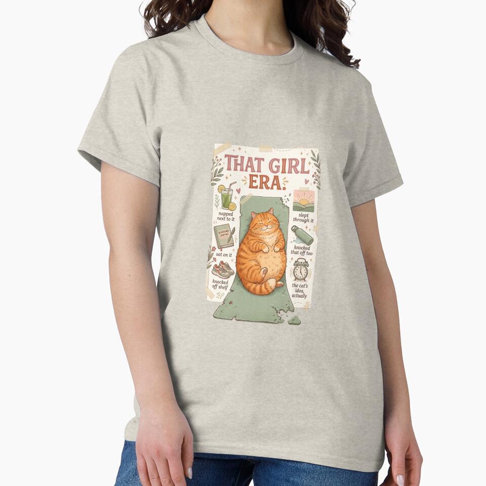 That Girl Era Cat T-Shirt — Funny Wellness Parody Orange Cat On Yoga Mat — Morning Routine Cat Lover Gift — Cozy Relatable Cat Humor Graphic Tee by Cozy Cat Collective