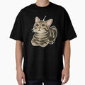 Brown tabby cat loafing by CreationsByBear