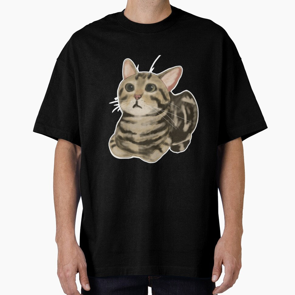 Brown tabby cat loafing by CreationsByBear