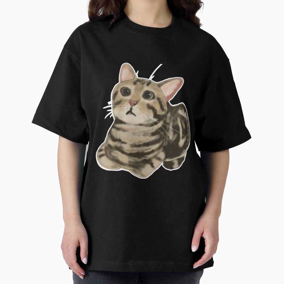 Brown tabby cat loafing by CreationsByBear