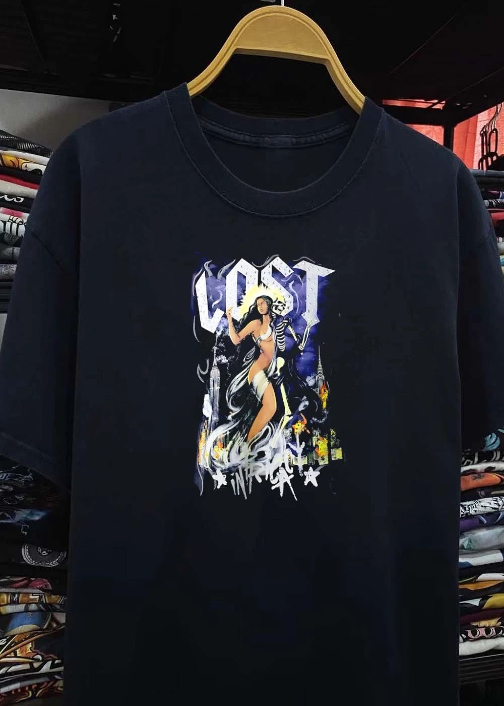 Lost goddess skeleton and city skyline shirt