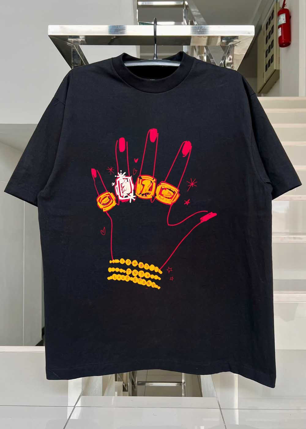 Hand Wearing Rings and Bracelets 13 + 87 TNT Love Story T-Shirt